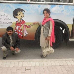 Gogi on the bus with her creator